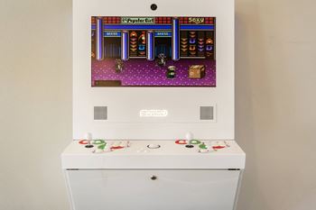 an arcade gaming system at Altitude Apartments  at Altitude, East Wenatchee